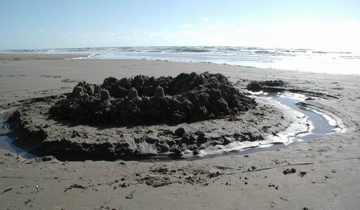 Castles in the sand, North Sea, The Netherlands - photo credit Stan Schaap